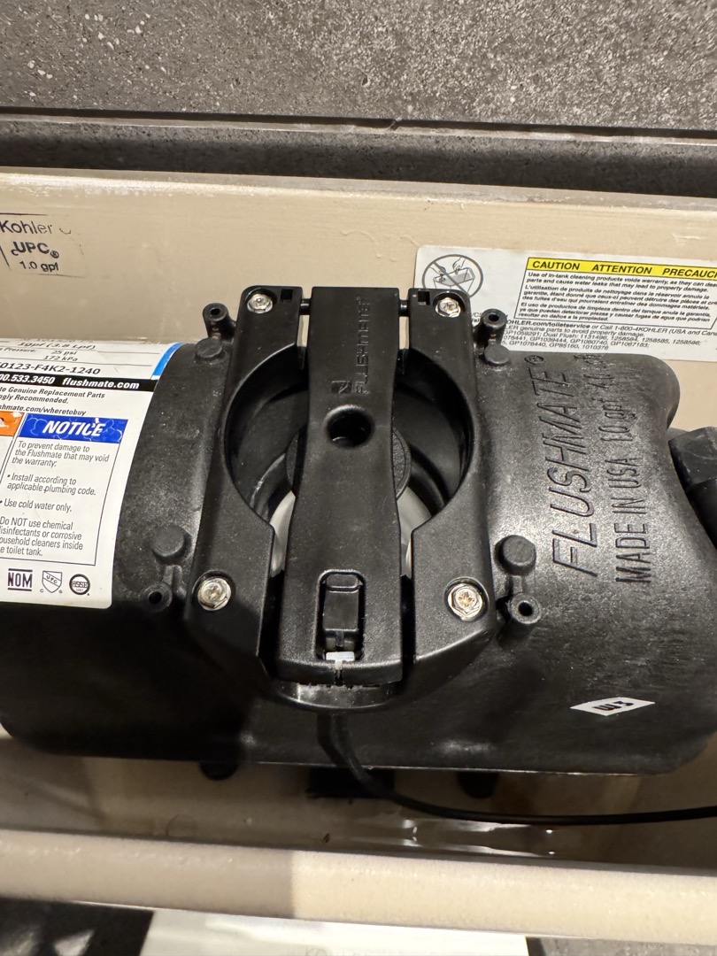 During the service, I thoroughly tested the toilet by flushing it over twenty times, observing that the cartridge reset correctly each time. The cartridge and bladder appeared new, with no visible cracks or damage. Despite the toilet's pristine condition, the high usage during peak hours seemed to strain its performance. I noted that the bathroom door was frequently pulled, indicating heavy use. The shift supervisor confirmed issues during busy periods. To diagnose the problem, I recommend visiting during these peak times.
