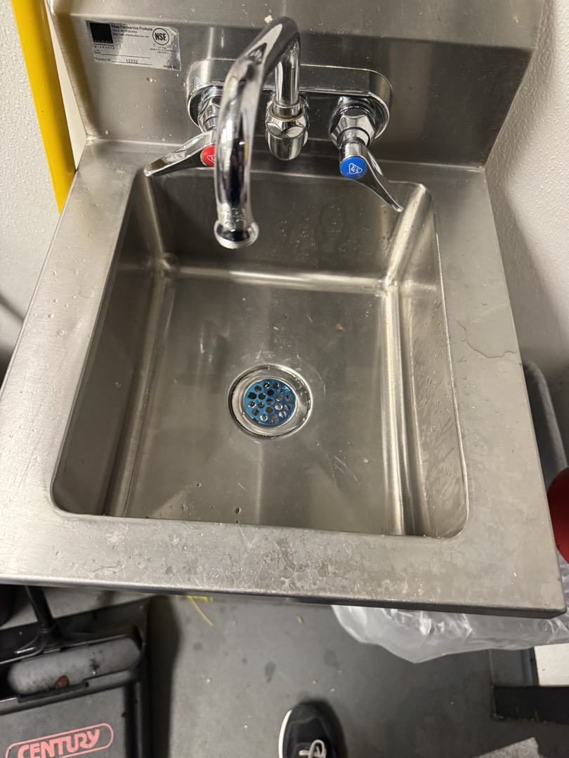 Upon inspection, I identified a leak originating from the sink strainer. I carefully removed the old strainer, ensuring no damage to the surrounding fixtures. A new junior basket strainer was then installed, followed by the reset of the tailpiece using a fresh 1-1/2” plastic lock ring. After completing the installation, I conducted thorough testing to confirm the absence of any leaks. The job was performed under the supervision of Manager Danielle, who was present on site. All parts used were accounted for and properly installed.