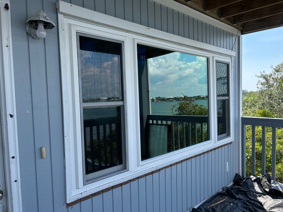 Installed 7 Impact Vinyl Windows and 1 Impact Sliding Glass Door