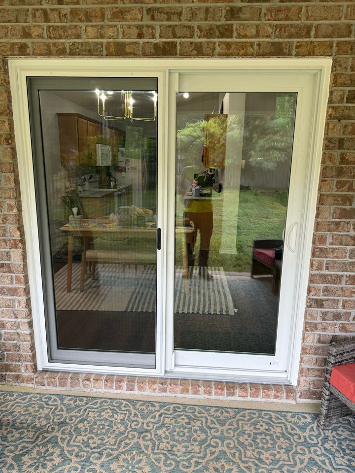 Installed 1 Sliding Glass Door and 4 Storm Panel