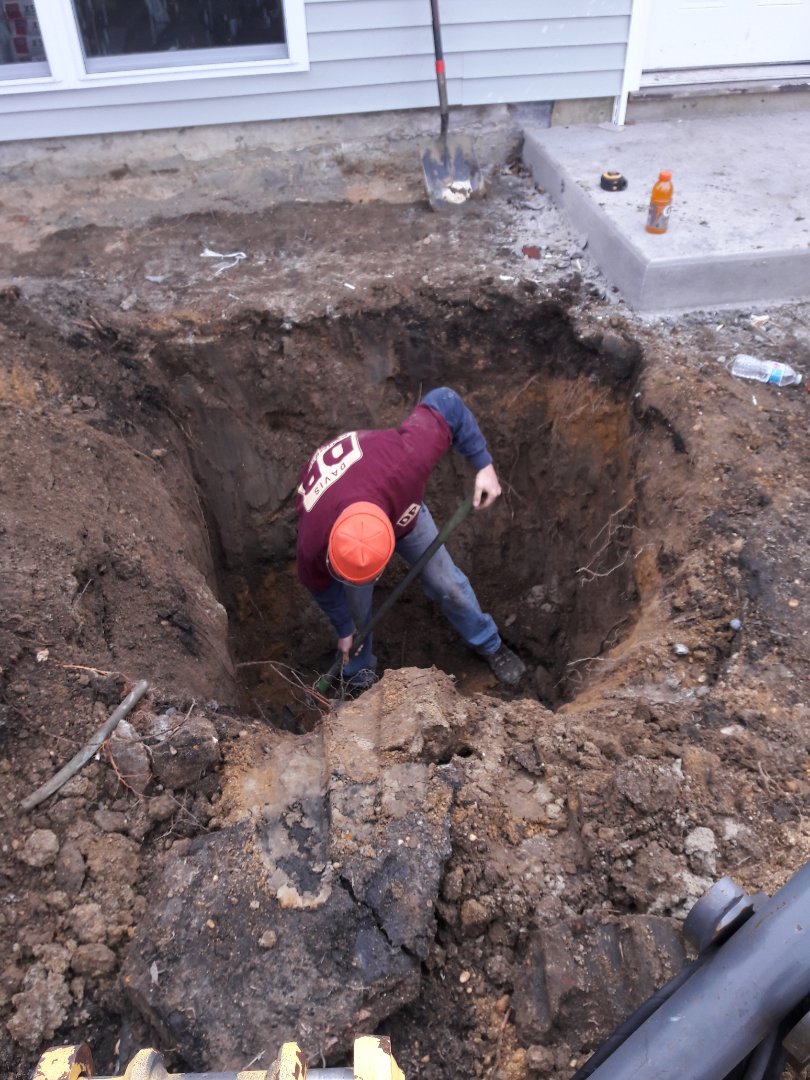 Dug up front yard to connect new bathroom into existing drain line