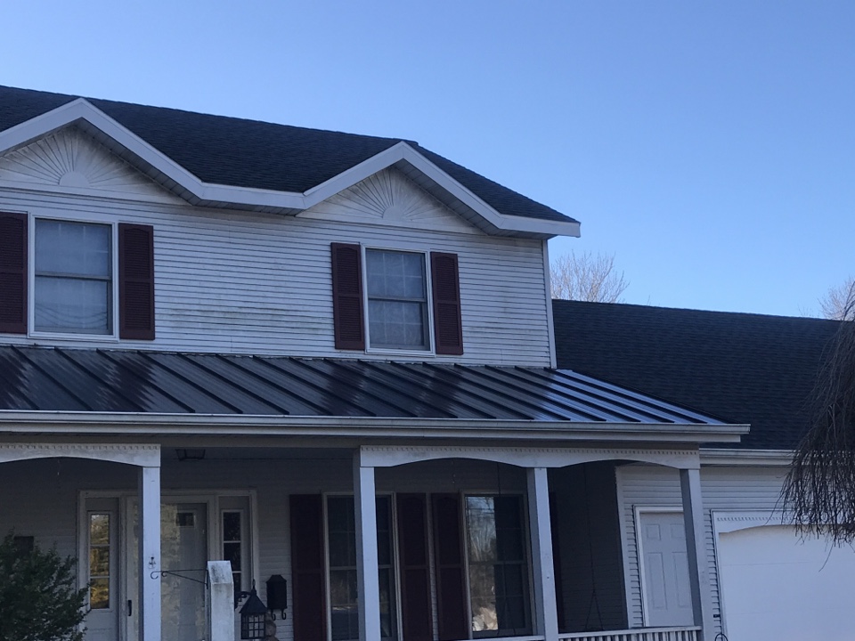 Holland, MI - Completed roof with metal highlights over the porch Holland, MI - Completed roof with metal highlights over the porch