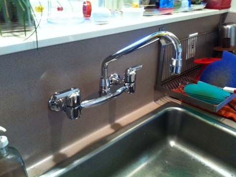 Berkeley, CA - Goodness gracious! Just look at this bold and beautiful wall-mounted Wolverine Brass kitchen faucet, freshly installed by yours truly. With its wing handles and high arching 8in spout, you'll WANT to do dishes. With a 5 year warranty on parts and labor from us, and a lifetime warranty on the internal components from the manufacturer, this faucet is ready to help carry on your legacy for generations to come. Berkeley, CA - Goodness gracious! Just look at this bold and beautiful wall-mounted Wolverine Brass kitchen faucet, freshly installed by yours truly. With its wing handles and high arching 8in spout, you'll WANT to do dishes. With a 5 year warranty on parts and labor from us, and a lifetime warranty on the internal components from the manufacturer, this faucet is ready to help carry on your legacy for generations to come.
