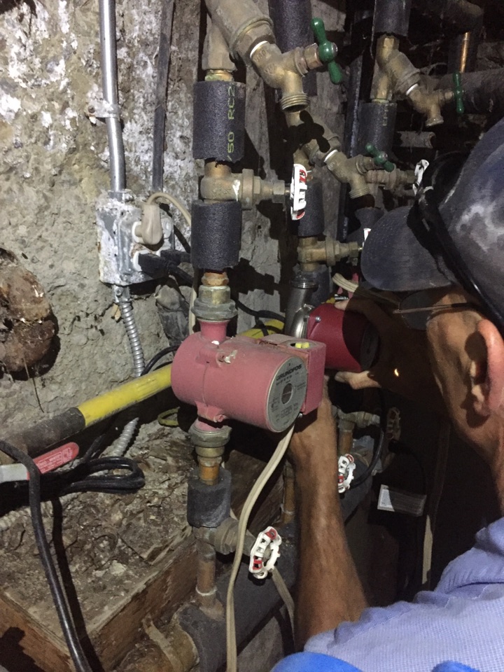 Berkeley, CA - Chris replacing a Grundfos recirculation pump to supply this apartment complex with instant hot water for all. Berkeley, CA - Chris replacing a Grundfos recirculation pump to supply this apartment complex with instant hot water for all.