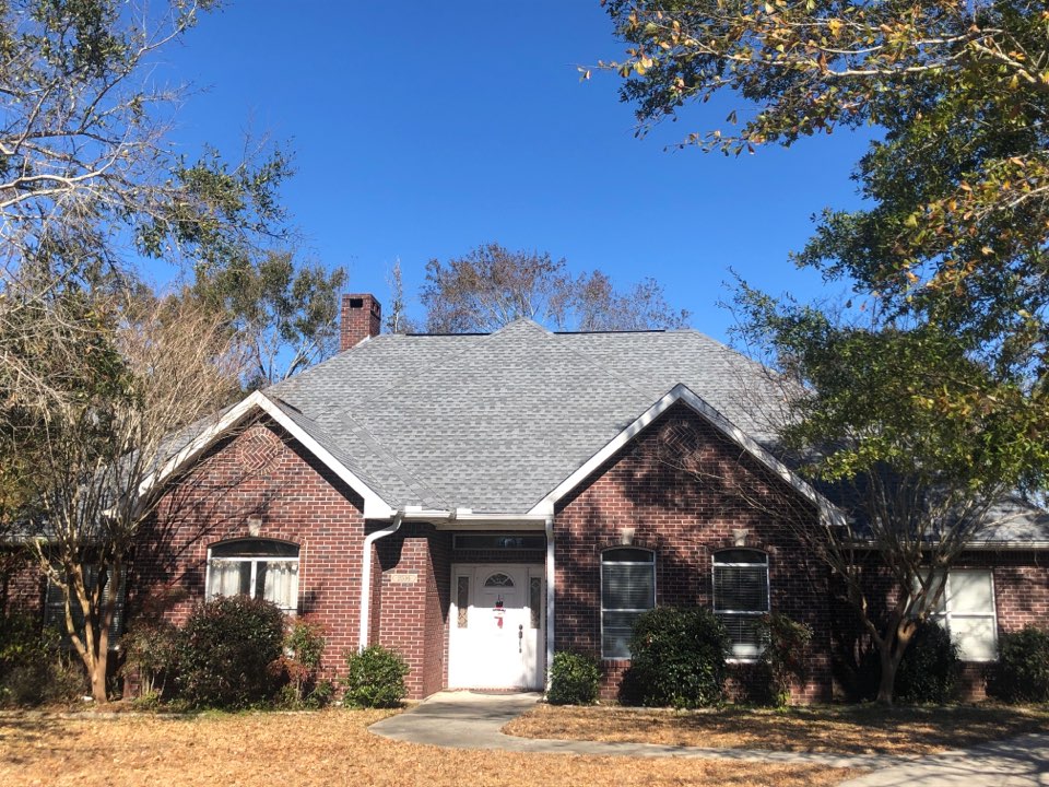 Biloxi, MS - B&M Roofing. This beautiful brick one story family home is surrounded by gorgeous oak trees and rosebushes. Their roof took damage and hurricane Zeta and had a loss of their three tab shingles. Our company provided them with timberline HD Z pewter gray shingles with a 50 year warranty for some peace of mind when the next storm hits. Their pups were precious and their neighbors were very friendly. We enjoyed working with them and their neighborhood greatly. Biloxi, MS - B&M Roofing. This beautiful brick one story family home is surrounded by gorgeous oak trees and rosebushes. Their roof took damage and hurricane Zeta and had a loss of their three tab shingles. Our company provided them with timberline HD Z pewter gray shingles with a 50 year warranty for some peace of mind when the next storm hits. Their pups were precious and their neighbors were very friendly. We enjoyed working with them and their neighborhood greatly.
