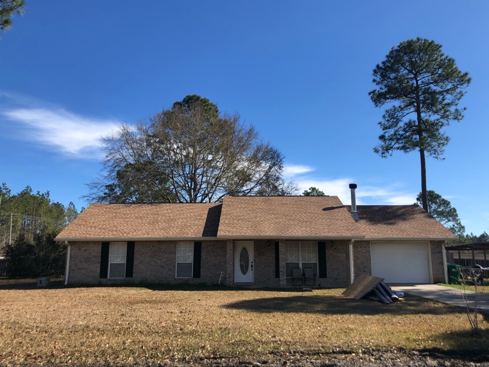 Kiln, MS - This one story home took roof damage and hurricane Zeta. B&M roofing was able to replace their three tab shingles with gorgeous GAF timberline HDZ architectural shingles in the color Shakewood. Kiln, MS - This one story home took roof damage and hurricane Zeta. B&M roofing was able to replace their three tab shingles with gorgeous GAF timberline HDZ architectural shingles in the color Shakewood.