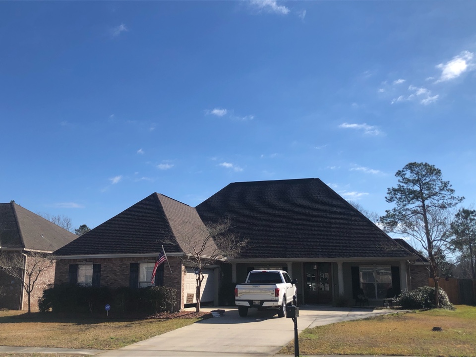 Long Beach, MS - This gorgeous home had unfortunate roof damage during Hurricane Zeta. B&M Roofing replaced their entire roof using GAF Lifetime Series Timberline HDZ shingles in Barkwood. Long Beach, MS - This gorgeous home had unfortunate roof damage during Hurricane Zeta. B&M Roofing replaced their entire roof using GAF Lifetime Series Timberline HDZ shingles in Barkwood.