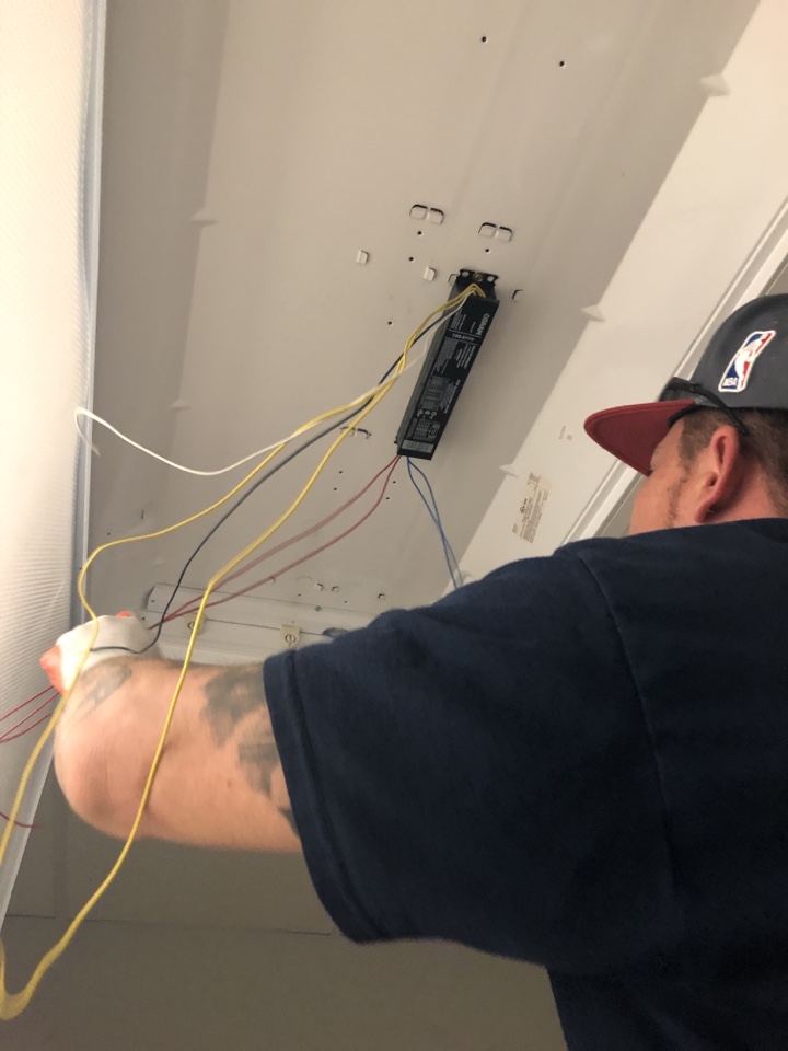 Replacing light fixtures in men bathroom 