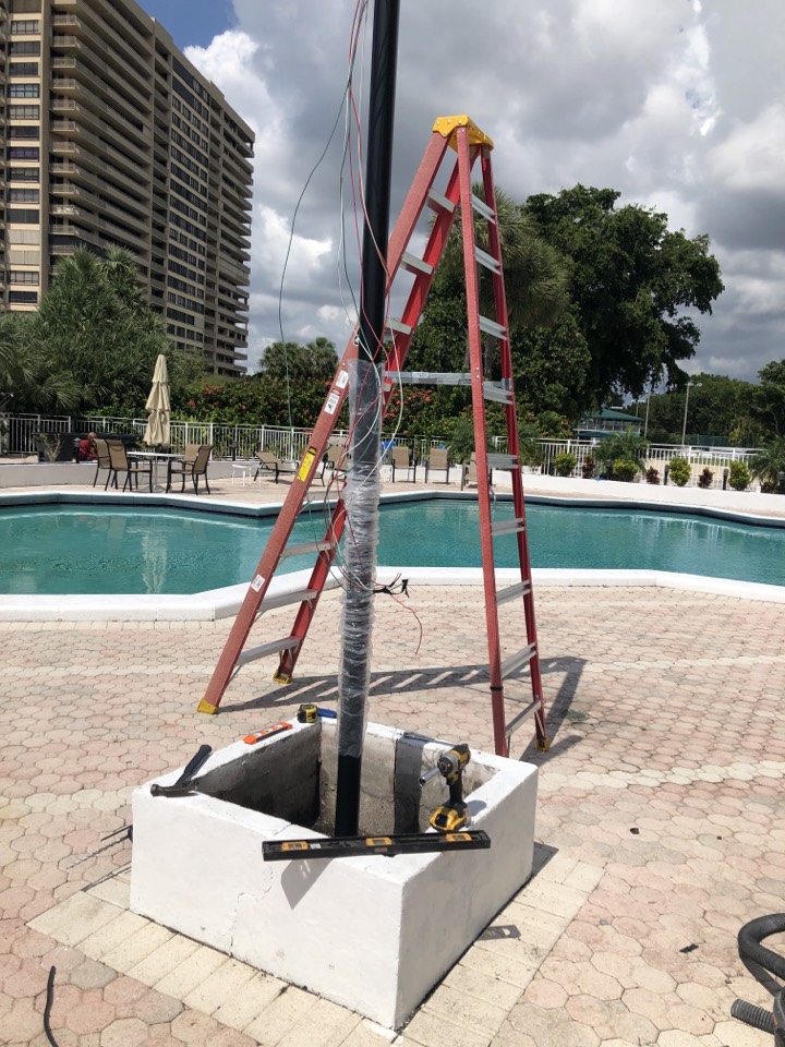 Installing new 10 foot light pool by pool area Installing new 10 foot light pool by pool area