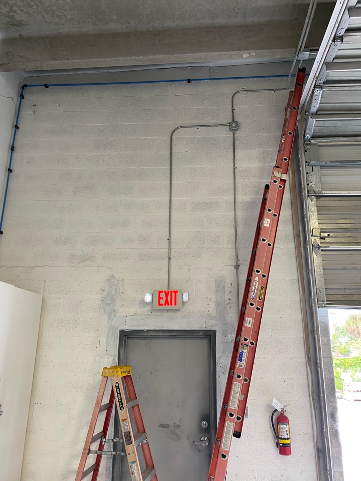 Miami, FL - Installed fire exit sign Miami, FL - Installed fire exit sign
