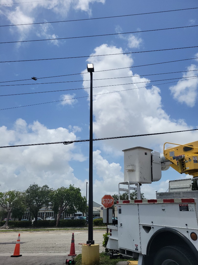 Miami, FL - Installed new pole and light fixture in Brown USA. MIAMI FL