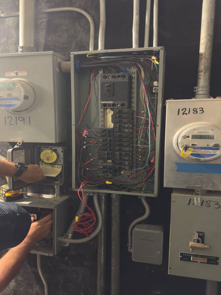 Removing old panel and installing new one for shopping center 