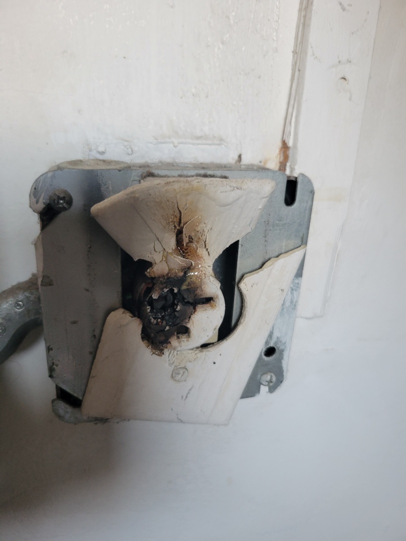 customer had a burn outlet and water heater cord burned. cut burn section and removed outlet and wired directly to power.
