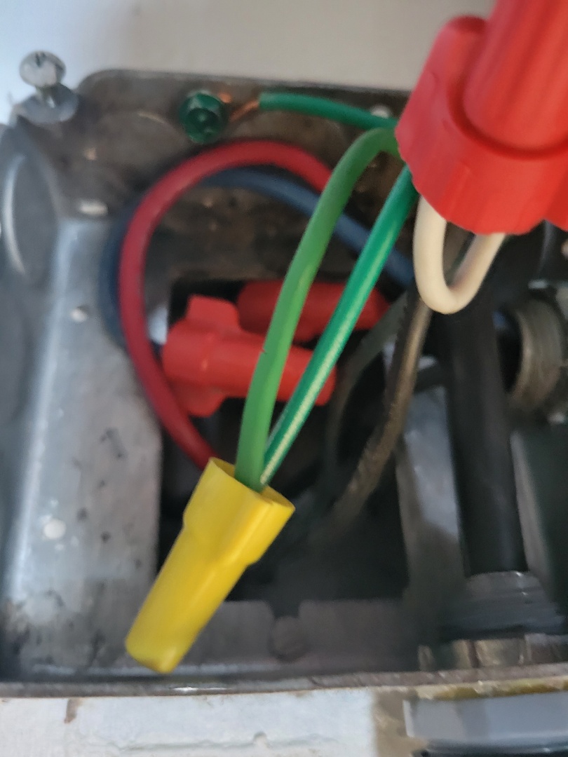 Hollywood, FL - customer had a burn outlet and water heater cord burned. cut burn section and removed outlet and wired directly to power.
