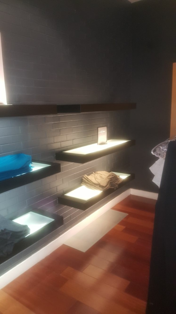 Miami, FL - Local Miami electrician installing showroom/ display lighting for a retail customer. Miami, FL - Local Miami electrician installing showroom/ display lighting for a retail customer.