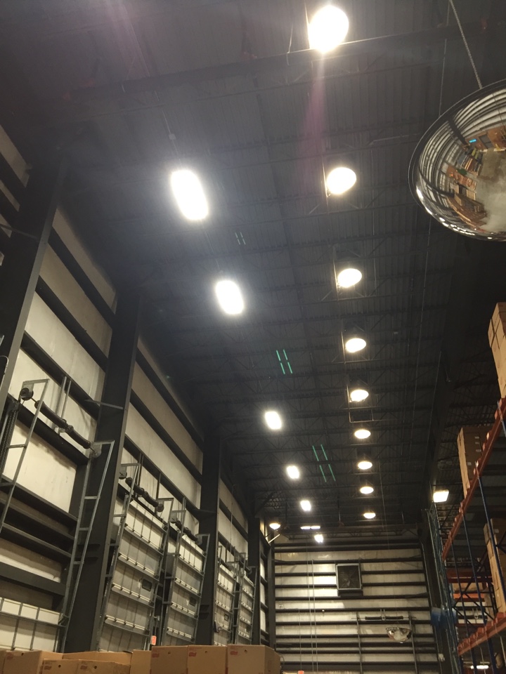 Commercial electrician providing maintenance for warehouse.  Energy efficient LED retro fit West Palm Beach, FL