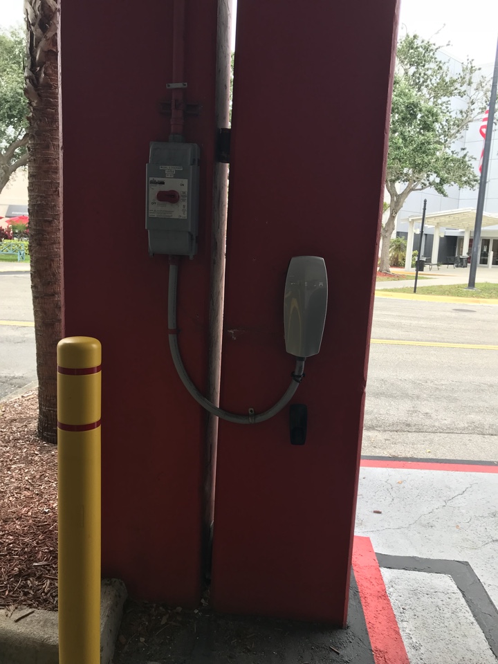 Checking and making safe damages Tesla charging station