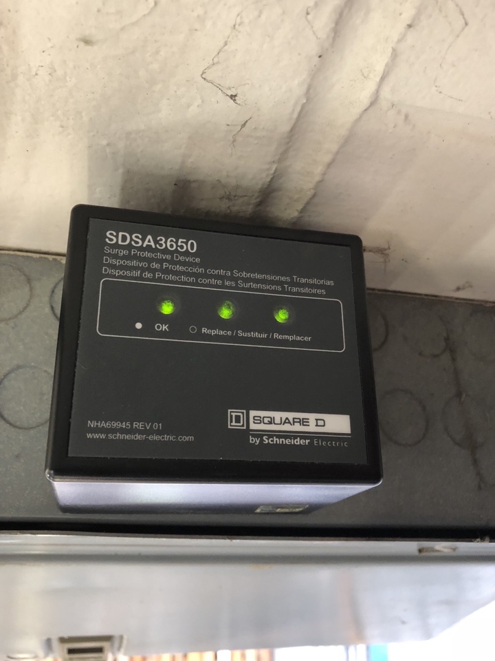 Professional Electrician Installation of new surge protector Professional Electrician Installation of new surge protector