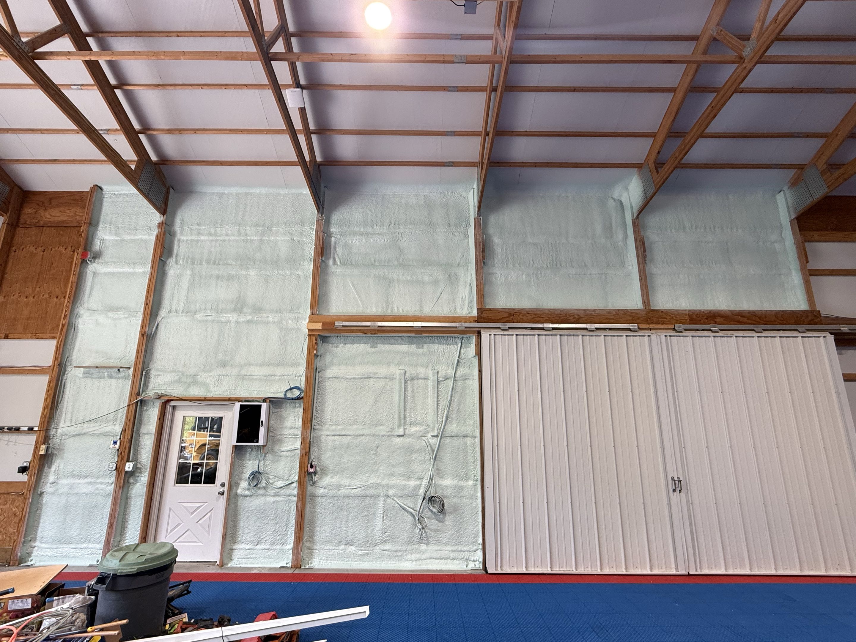 Customer wanted game room more comfortable. We sprayed 2 in of close cell foam.