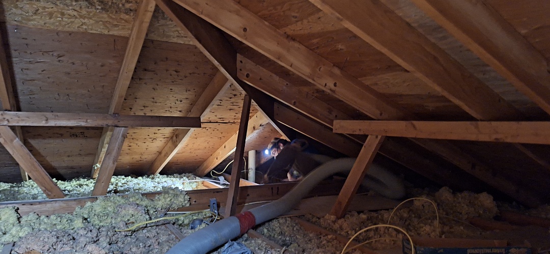 Removing old nasty mouse contaminated fiberglass to get the attic ready for spray foam encapsulation in Topeka KS