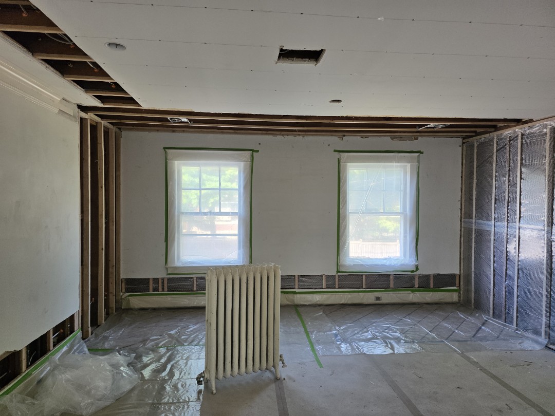 this 1920s home in Kansas City Missouri, needed insulation badly. The old, degraded, mouse infested insulation in the crawl space and exterior walls is getting updated to open cell and closed cell spray foam. They are also getting some much-needed sound deadening between restrooms and bedrooms. 