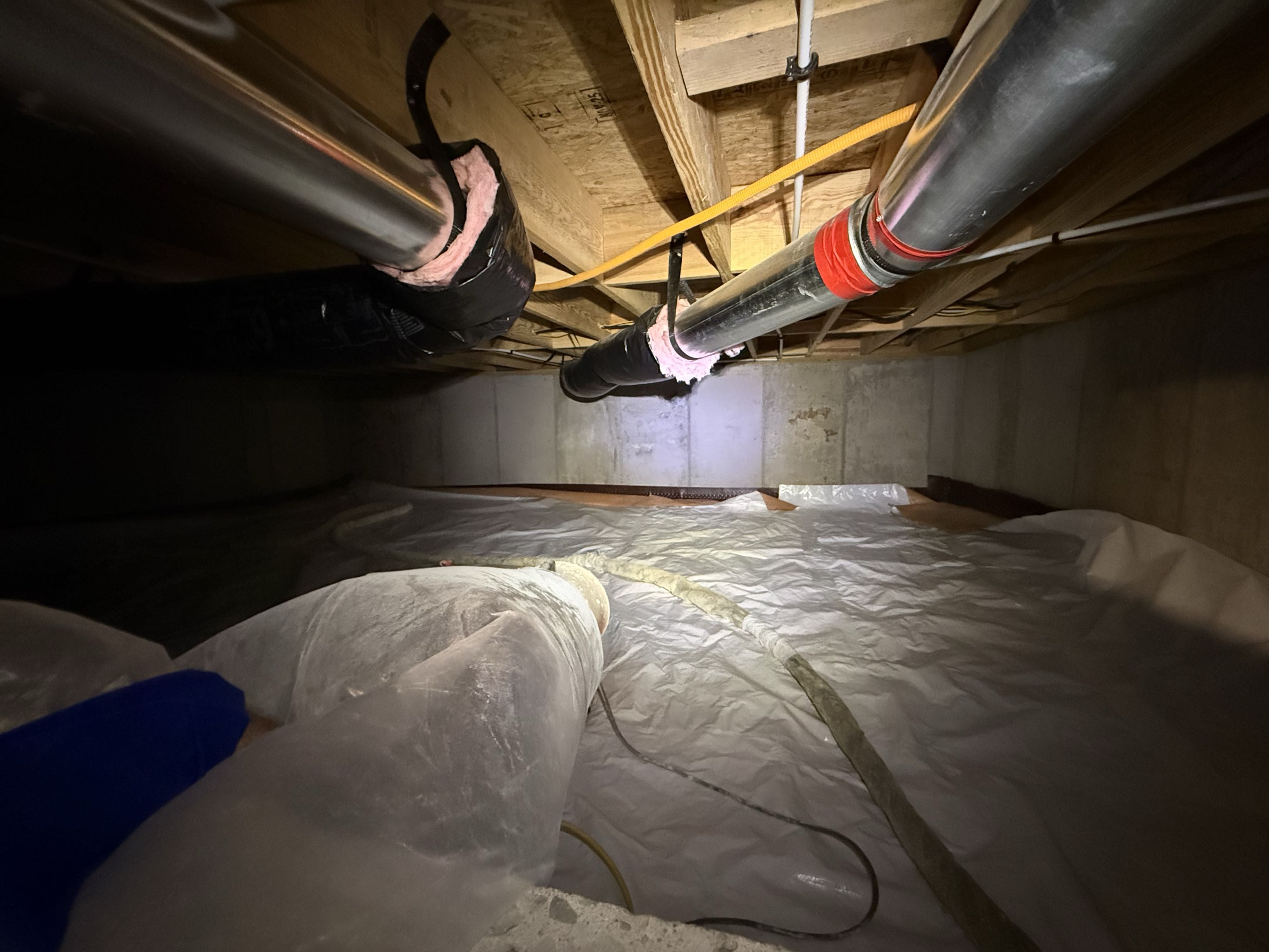 Meriden, Kansas. Laid out drainage matting and then a vapor barrier and finished off with 2 inches of closed cell foam on the exterior walls and rim joist.