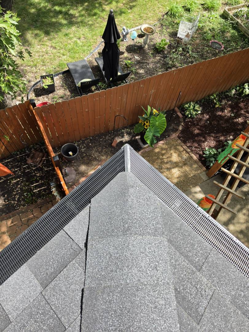 Installing new gutter guards on customers home in lawrence ks.