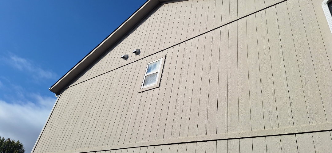 Installing soffit vents for proper ventilation and ducting bath fans to prevent mold in Gardener KS