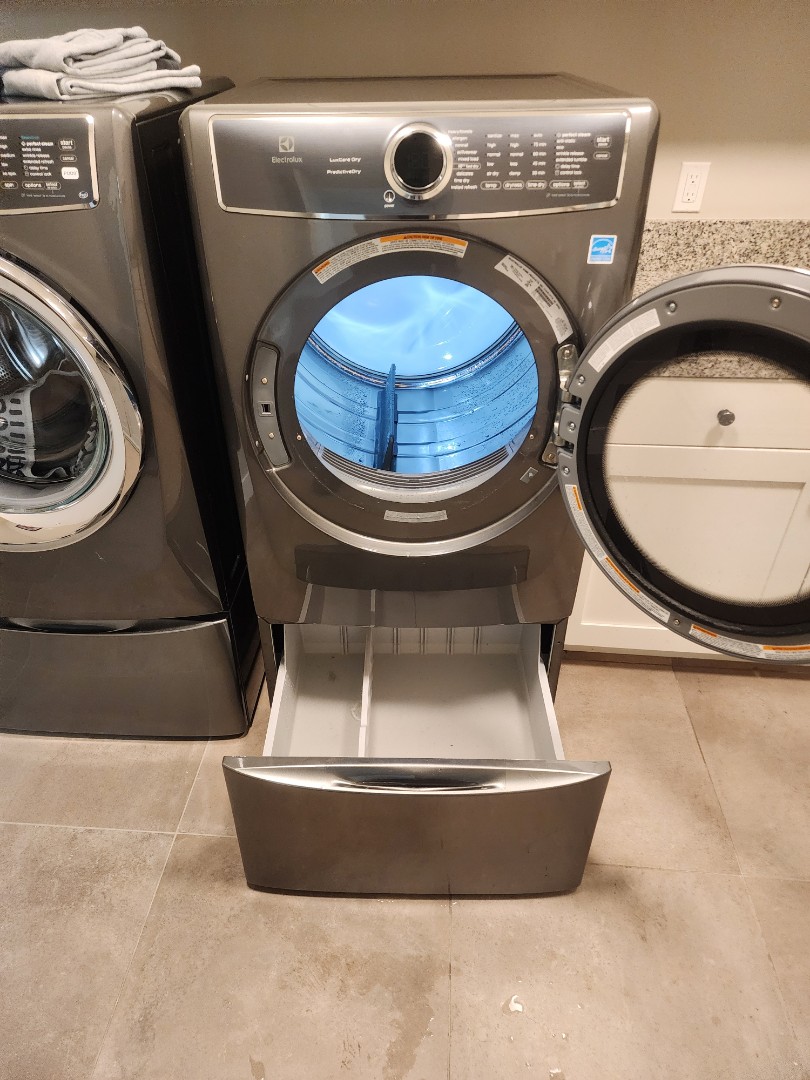 A customer reported an Electrolux dryer unexpectedly filling with water during the night. Upon inspection, I discovered a malfunctioning water inlet valve responsible for the steam feature. The faulty valve was allowing water to enter the dryer when it shouldn't have. I replaced the defective water inlet valve with a new one, ensuring the dryer would no longer accumulate water. The dryer now functions correctly, and the customer is satisfied with the repair.