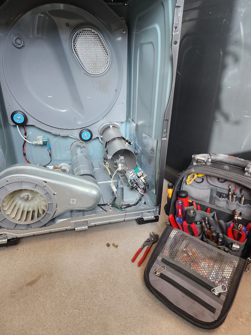 Upon inspection of the Samsung electric dryer, it was determined that the heating element was faulty, preventing the dryer from effectively drying clothes. The faulty heating element was promptly replaced with a new one to restore proper functionality. Additionally, the interior of the dryer cabinet was thoroughly cleaned by brushing and vacuuming to remove any lint or debris that could potentially obstruct airflow or cause overheating. These actions ensured the dryer would operate efficiently and effectively dry clothes. The dryer was tested to confirm the successful resolution of the issue.