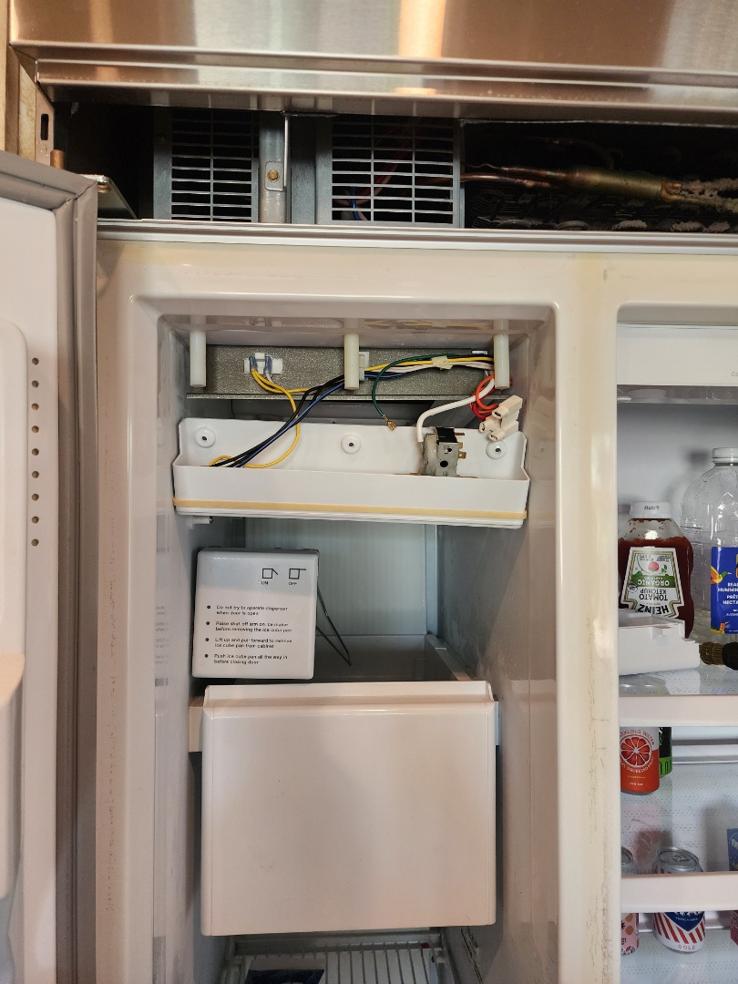 Upon inspection of the KitchenAid built-in refrigerator, it was determined that the cooling system was not functioning correctly. A thorough examination revealed a faulty cold control thermostat, which was promptly replaced to restore proper temperature regulation. Additionally, the condenser coil was found to be dirty, which can impede cooling efficiency. To address this, the coil was meticulously brushed and vacuumed, ensuring optimal performance. These corrective actions have restored the refrigerator's cooling capabilities, ensuring food safety and appliance longevity.