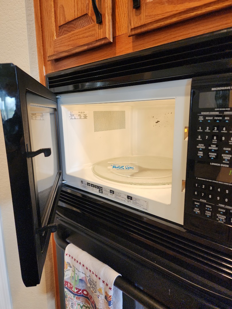 the microwave was not heating, and the turntable was not rotating. I began by examining the microwave's internal components, focusing on the interlock switches, which are crucial for safety and operation. After thorough testing, I identified a failed interlock switch as the root cause. I replaced the faulty switch with a new one, ensuring it was correctly installed and securely connected. Post-replacement, I tested the microwave to confirm that both the heating function and turntable rotation were restored. The customer was pleased with the resolution, and the oven is now fully operational.