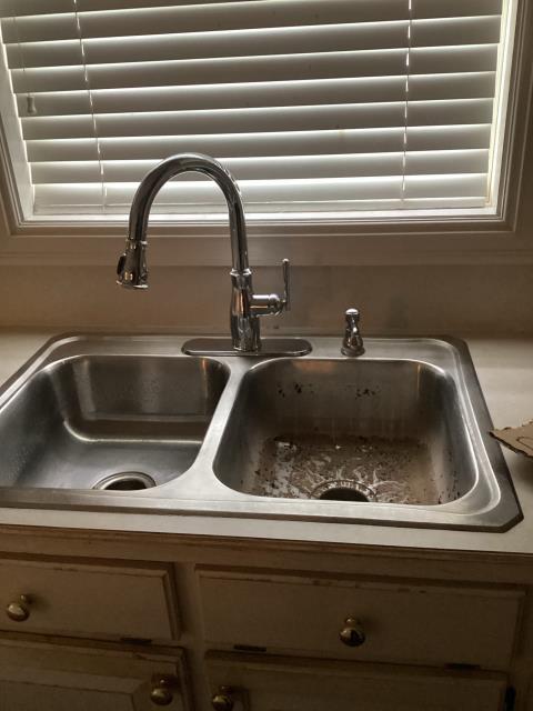 Monroe, LA - Cleared a clogged kitchen sink and removed buildup causing the stoppage. Tested for proper drainage before completion.