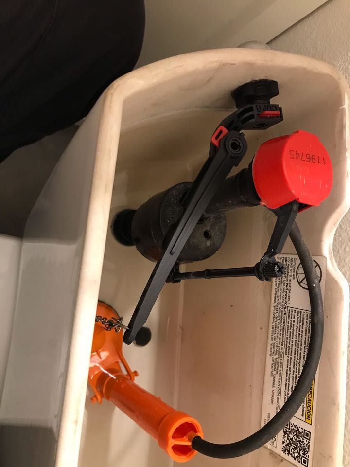 Replaced flush valve, toilet handle, and installed two vacuum breakers on hose bibs. 