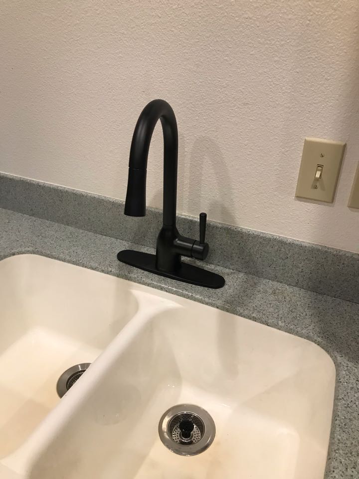 Replaced owner provided kitchen faucet. 