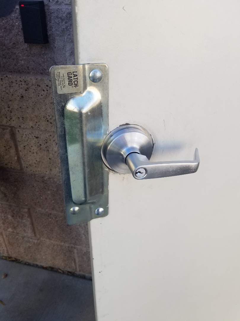 Finished ne commercial door leverset and latch guard installation, for added security! Las Vegas locksmith service.