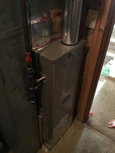 Found higher levels of CO2 on Carrier furnace during tuneup. Adjusted gas pressure, and now the unit is operating properly.