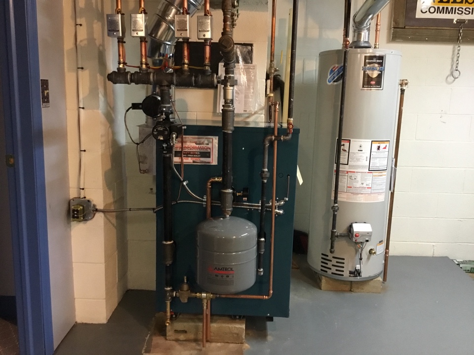 Gas boiler and water heater replacement. Installed a four zone U.S.Burnham boiler and a Bradford White water heater.