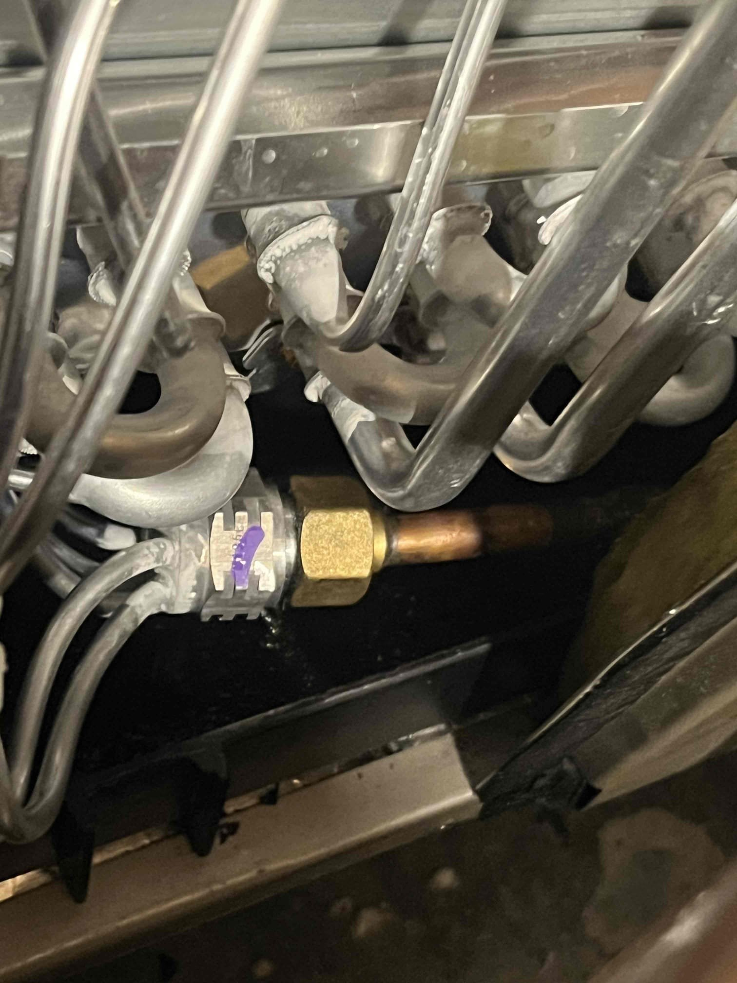La Quinta, CA - ⚒️⚒️ DEMAND SERVICE – NO COOL

🔧 Customer Concern:
Follow-up visit for system still not cooling after the evaporator coil was replaced earlier in the day.

🔍 Diagnostics:
• Checked refrigerant pressures — pressures were excessively high.
• Rinsed condenser coil and monitored pressures — pressures remained high.
• Inspected evaporator coil, filters, and return ductwork, including attic air intake — no airflow issues found.
• Further inspection revealed the evaporator coil had no TXV metering device installed; no piston/filter assembly was present.

🛠️ Repair:
• Pumped down the system.
• Separated refrigerant tubing and confirmed missing metering device.
• Installed TXV and restored system operation.

✅ Final Results:
System is now operating properly and within manufacturer operating limits.