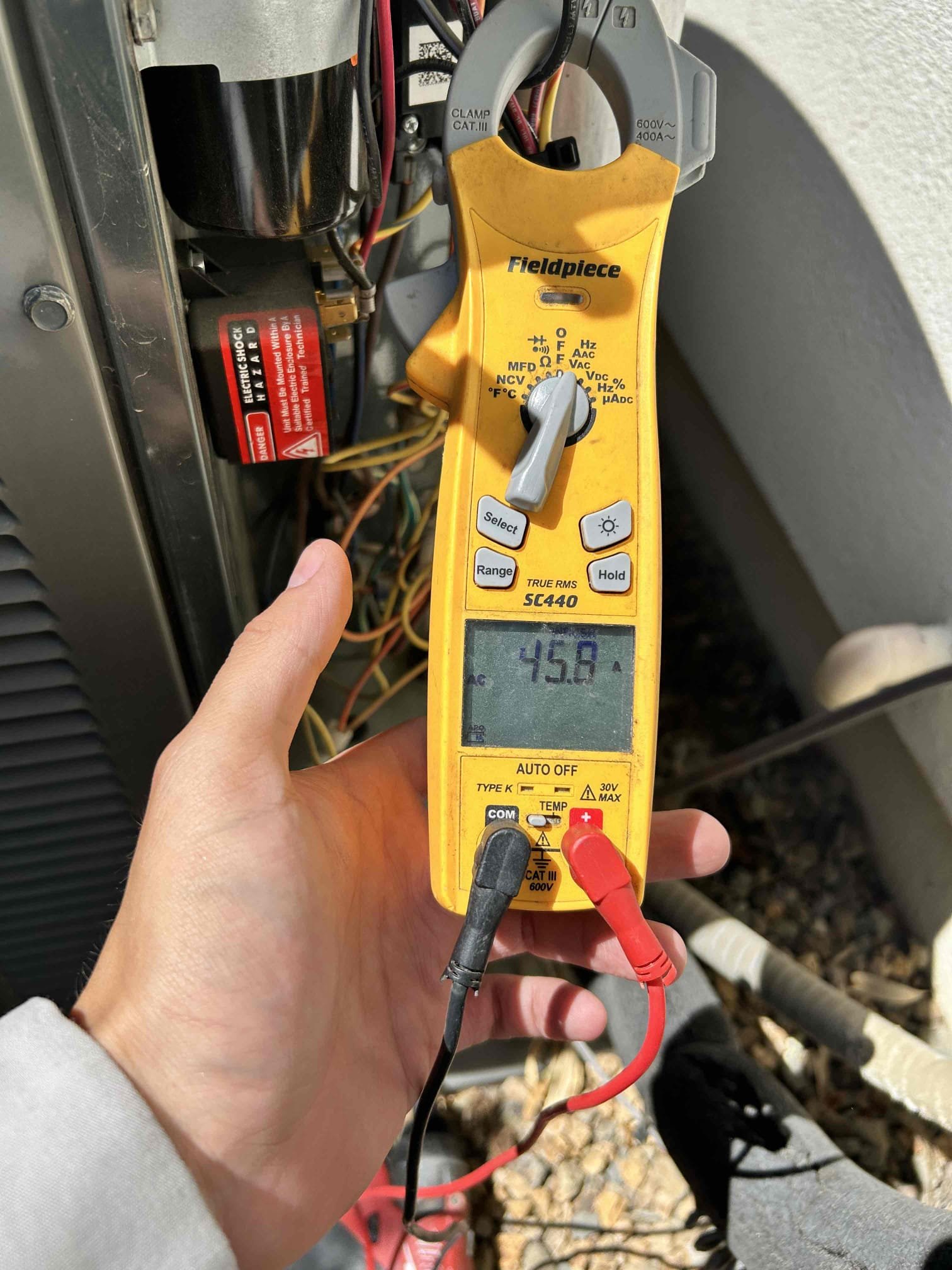 Performed annual maintenance on the 3.5 2017 Trane split-system.
 Replaced the 20 x 30, 14 x 24, and 8 x 8 air filters.
* Checked the T6 thermostat and verified the operating range and ability to reach the set point.
* Performed a full sequence-of-operations check.
* Inspected system levels and checked the compressor and electrical components.
* Checked capacitors and verified the dual capacitor rated 45/7.5 µF was within the appropriate operating range.
* Checked the start kit and verified its operating range.
* Cycled the system through startup and operation. No abnormal noise or issues were observed during startup.
* Client reported previously hearing a humming sound from the system without the compressor starting.
* Washed down the condenser coil and verified the compressor was not overheating. System is operating properly at this time of service 