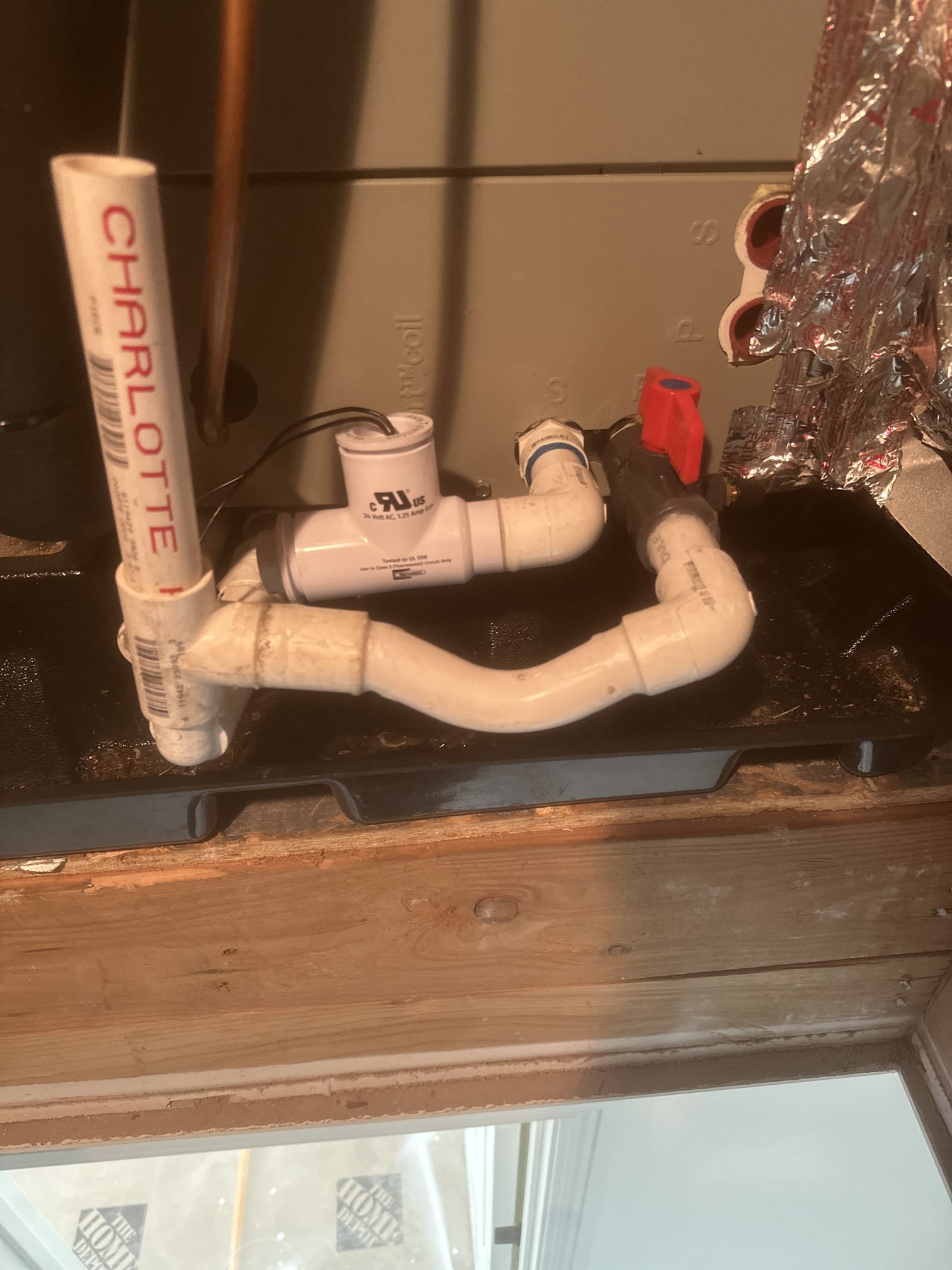 Returned to the property for a demand call regarding condensate leaking from the secondary drain. Upon inspection, found the primary and secondary drain lines had been switched. Cut and reconfigured the condensate piping to restore the primary drain to the proper configuration and termination. Performed a water test through the primary drain to verify proper flow and drainage at the correct termination. Installed a water safety switch at the secondary drain location and abandoned the previous secondary drain line. Allowed the system to operate for approximately 15 minutes to verify proper condensate drainage during operation. Residual water present in the auxiliary safety pan was from testing the condensate lines. No active water leakage into the home or accumulation in the safety pan was present upon arrival. System is currently draining properly with no active leaks observed at completion of service.
