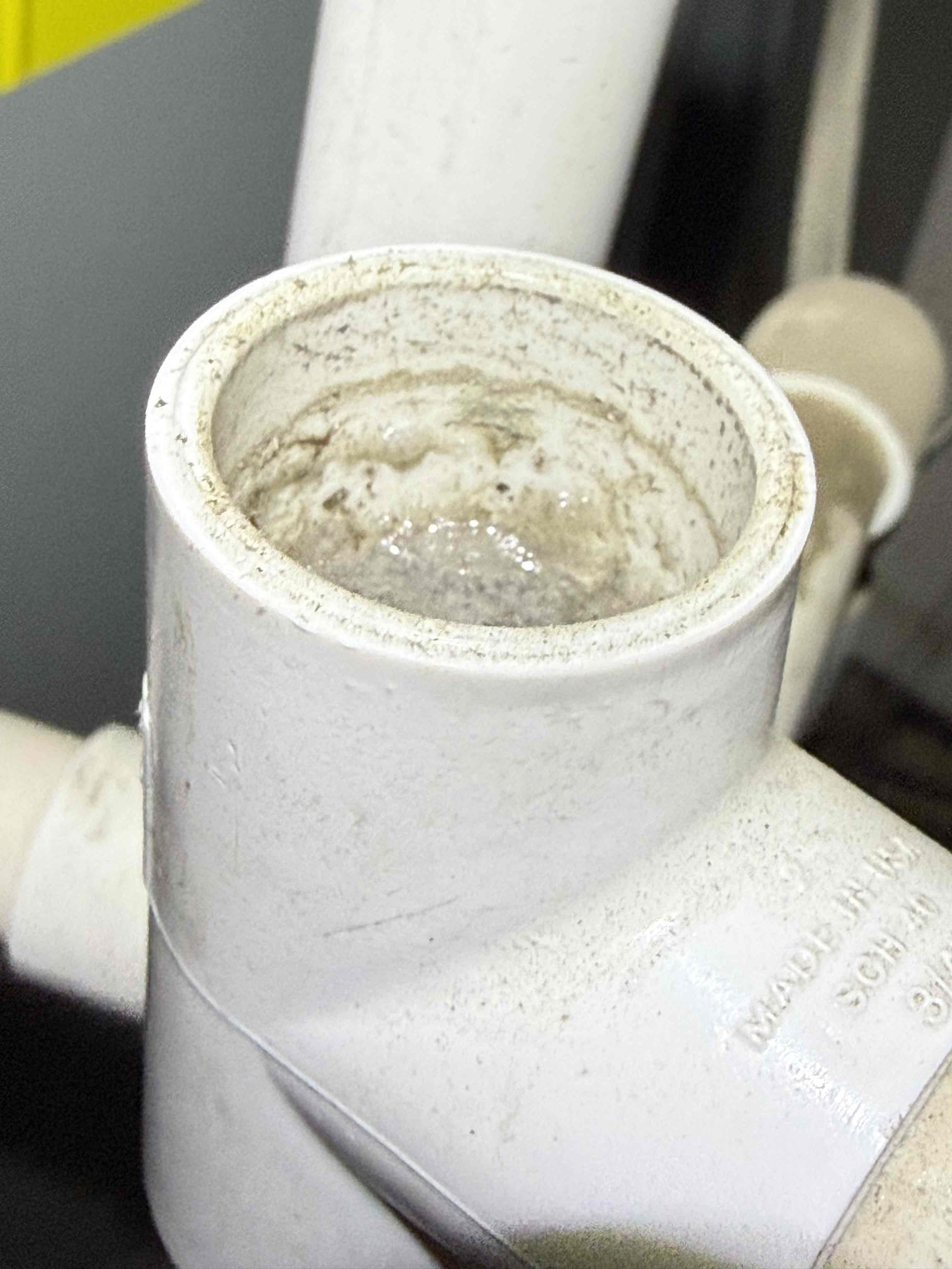 Rancho Mirage, CA - Found condensation drains backed up, termination elbows submerged in condensate, cleared that area out. Shop vacuumed all vents where water was at top. Then used pressurized air to clear them out fully, also shop vacuumed out water in water floats switches, after clearing removed water at termination points again. Informed homeowner if this happens again we should replace/redo the condensation drains, main one the traps combine into is lines with funk all the way and who knows how restrictive it is underground. Systems are at 73° and set for 73°.