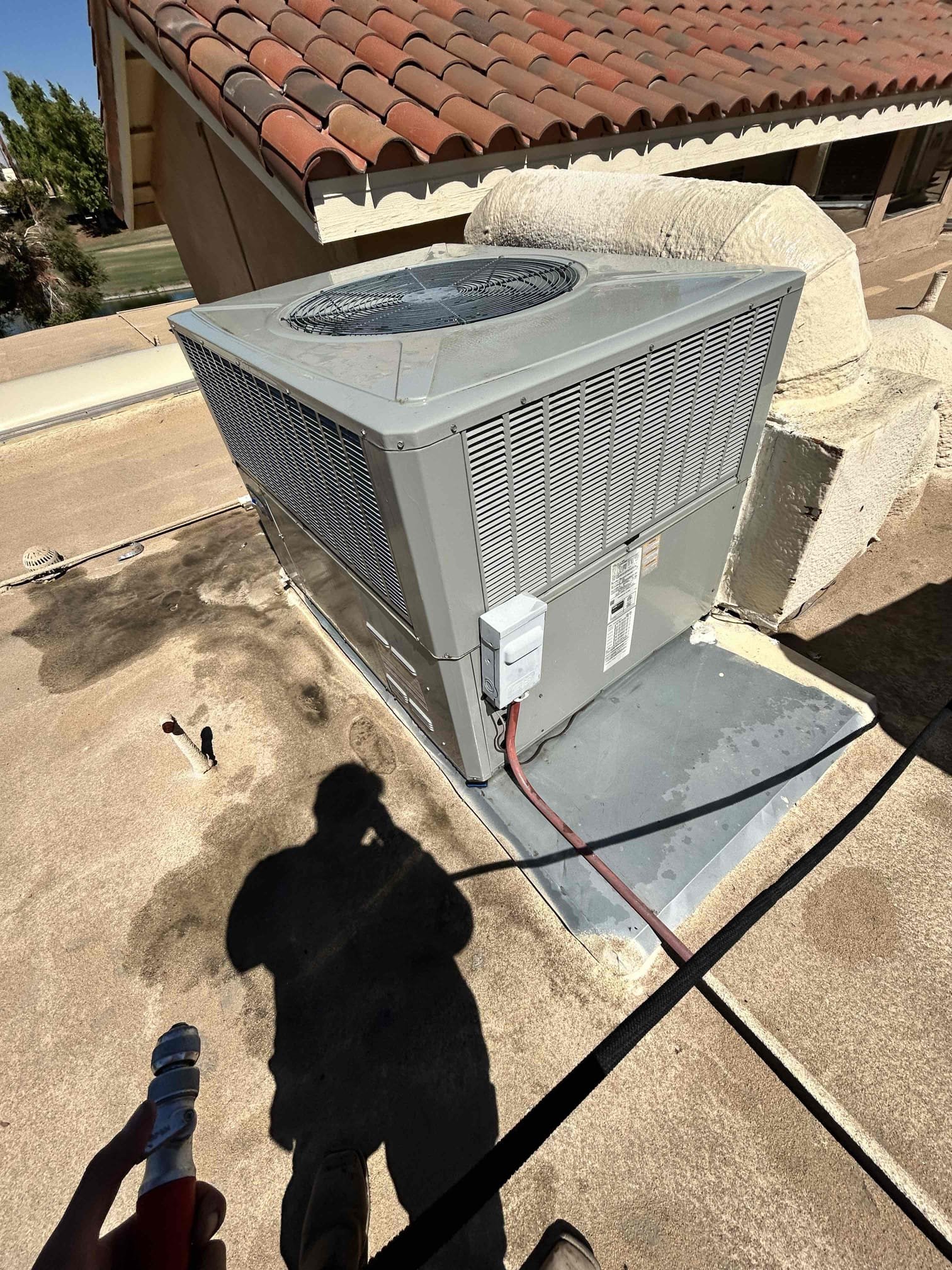 Performed annual maintenance on 2022 5 tonAmerican Standard package unit\.
- Replaced the 18” x 20” in package unit return  
- Inspected and serviced the package unit 
- Performed operational checks in both heating and cooling modes.
- Checked supply/return temperatures and verified heating and cooling temperature differentials.
- Checked compressor amperage and fan motor amperage.
- Checked compressor startup operation and electrical performance.
- Compressor amperage was approximately 10 amps above the manufacturer’s specified rating.
- Recommend installing a compressor hard -start kit start assist to help reduce compressor startup load and improve starting performance.
- Cleaned washed the applicable outdoor coil and inspected the unit for proper operation. 
The system is currently operating properly in both heating and cooling modes at the time of service. 