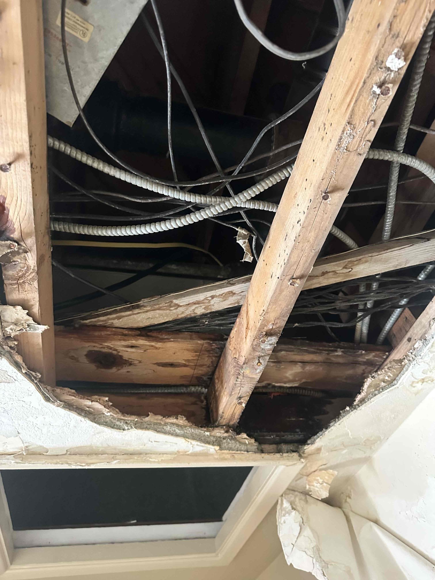 Palm Springs, CA - Upon arrival, client stated there was water leaking from the roof top to the first floor. Went upstairs checked package, units. There’s no water visible advised client there’s no way the water would be leaking from the roof to the first  floor not going through second floor first It’s not from the air conditioners. 