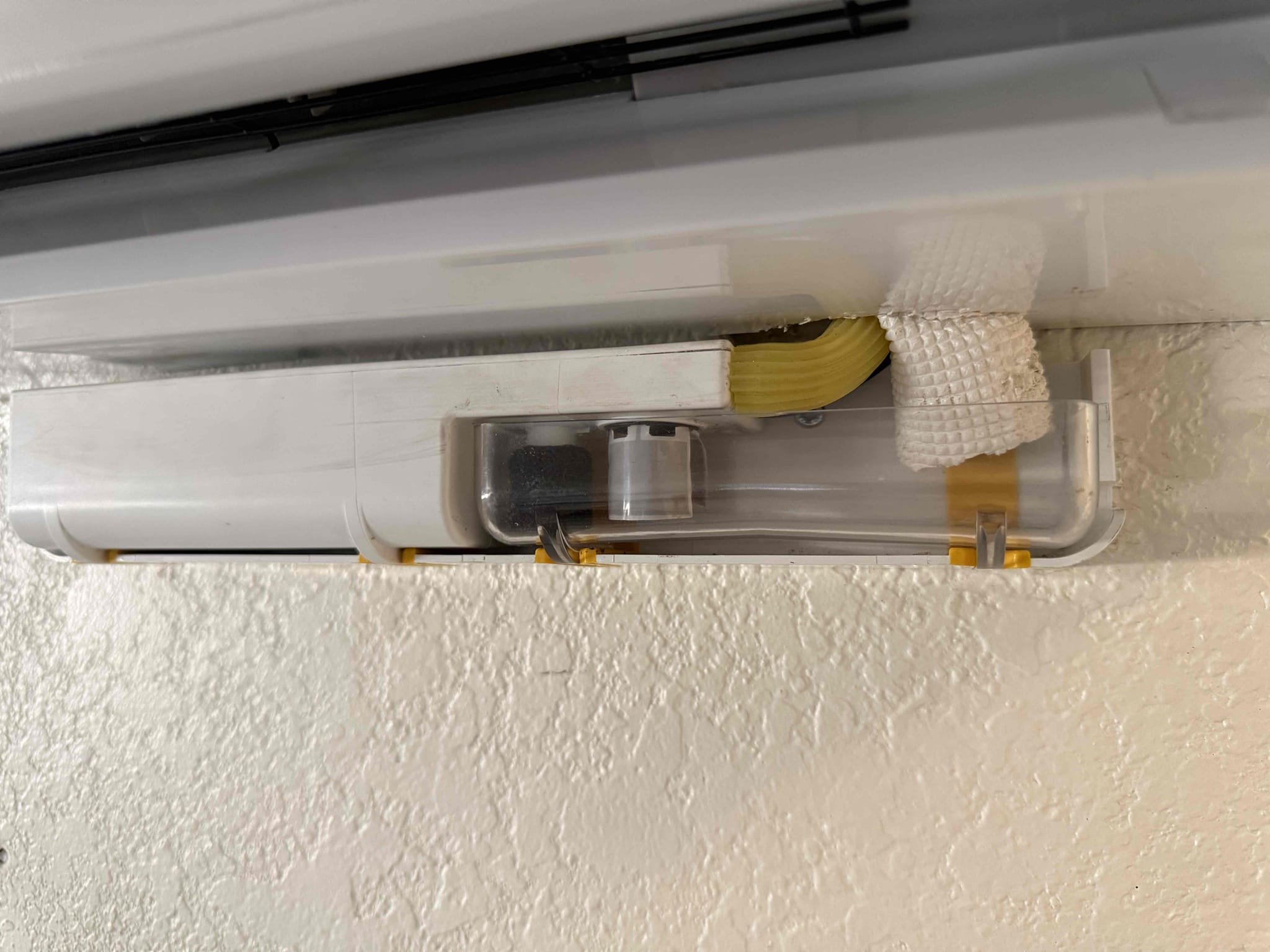 Client stated the condensate pump for the ductless system was making a gurgling noise. Ran unit for 10 mins and no noise present. Upon inspection, found the condensate filter, drain pan, and pump sensor had significant buildup and debris accumulation. Cleaned the drain pan, filter, and sensor to restore proper operation.

Poured water into the drain pan and verified the condensate pump is operating properly and removing water as designed, with no signs of backflow into the drain pan, and no sounds of gurgling. Informed client that the sensor being coated with wet debris buildup may have caused an inaccurate water-level reading, potentially causing the pump to activate and remove minimal amounts of water, which may have contributed to the gurgling noise.

Ductless system is draining properly and operating as expected at the time of service.