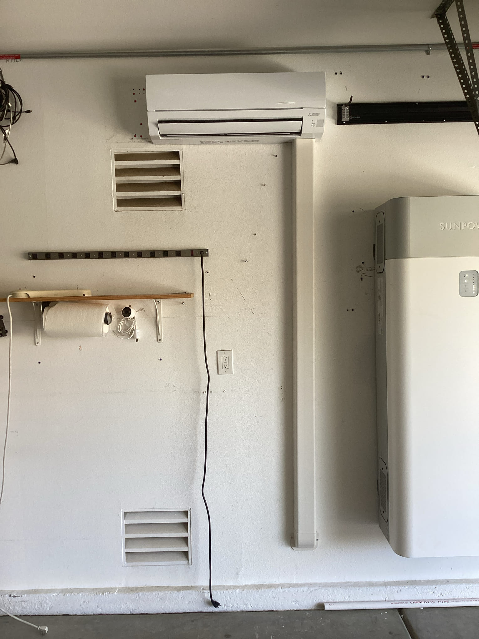Installing 1.5 ton Garage ductless: replace existing Daikin garage ductless with a AS Mitsubishi ductless heat pump.