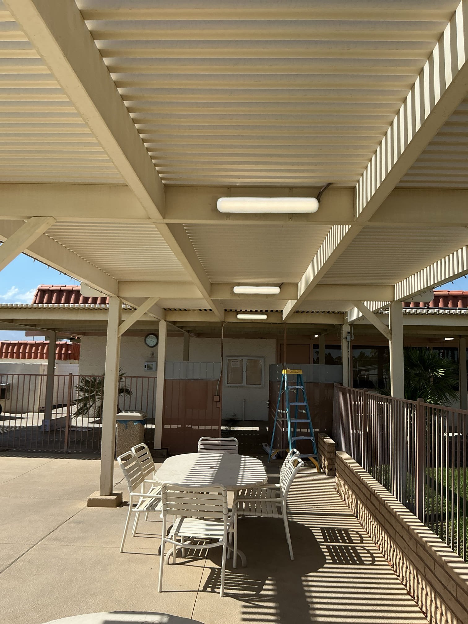 Arrived to remove and replace 8 outdoor fixtures that kept burning out. Removed four 4ft led fixtures over pathway and four 2ft fixtures in pool sitting area. 