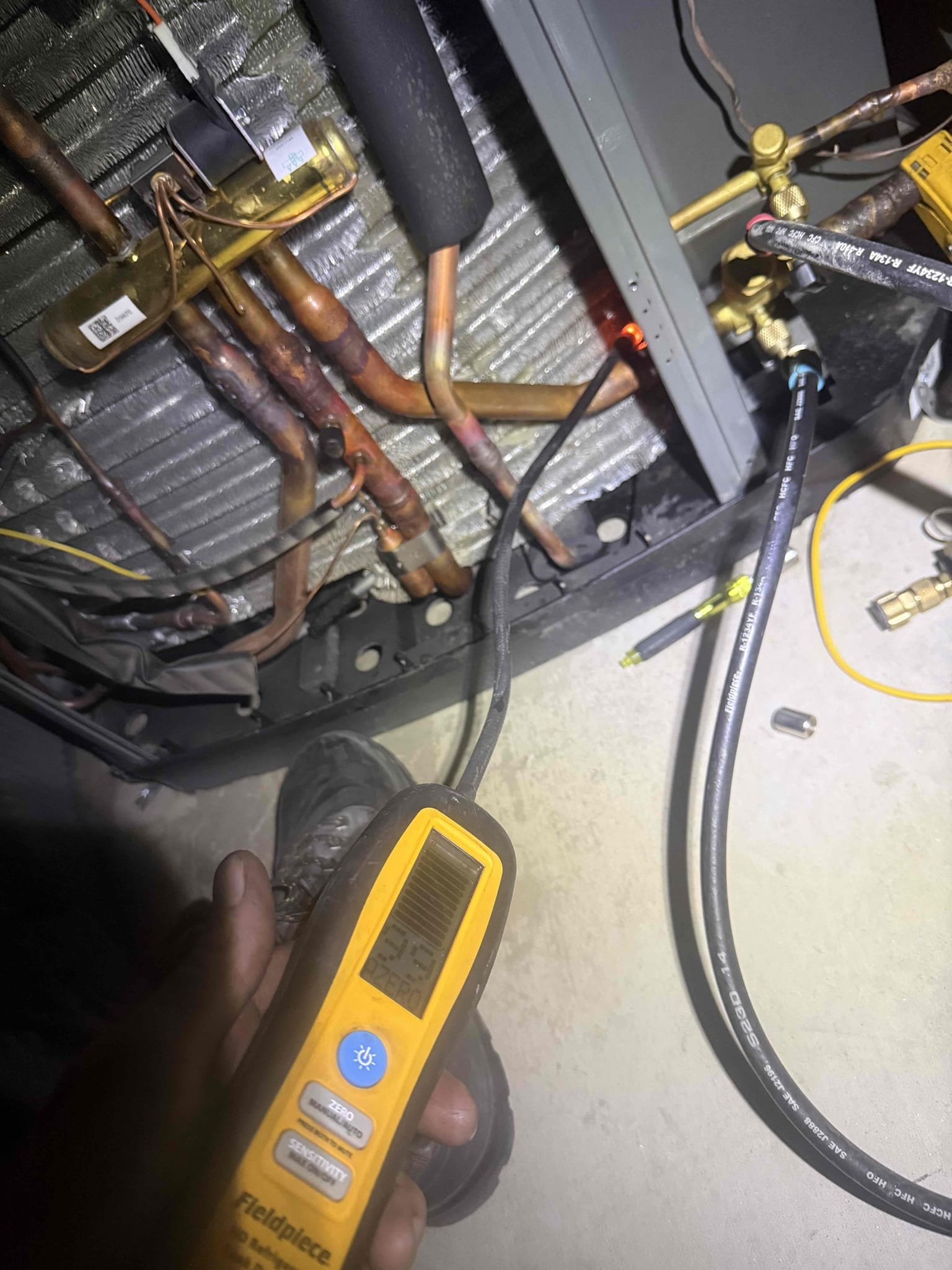 System had all loads operational but 85° in home and set for 80°. System needed a little refrigerant. Balanced charge and system pressures, superheat, subcool (8°) and temperature split (23°) were good and system is cooling properly now. Replaced a couple schrader cores. Checked for oil and then checked condenser all around service valves, and reversing valve side for any leaks. Took videos and photos on file. Notea