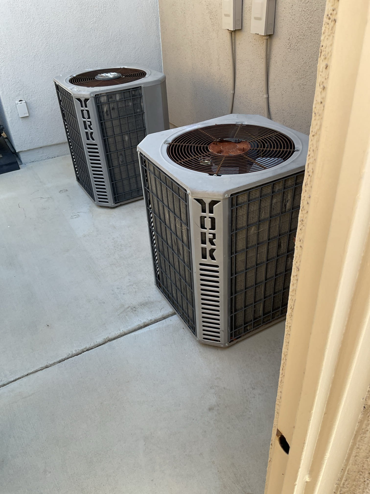 Turn the living room system on and examined evaporator coil and condensation termination on outside of the home. There were signs of oil residue indicating refrigerant leak.Unit #1241. spoke with client also emailed recommendations for two system replacement due to systems being 27 years old systems condition and use of R22 refrigerant which is no longer manufactured. spoke with client also sent estimate for partial replacement and repair.