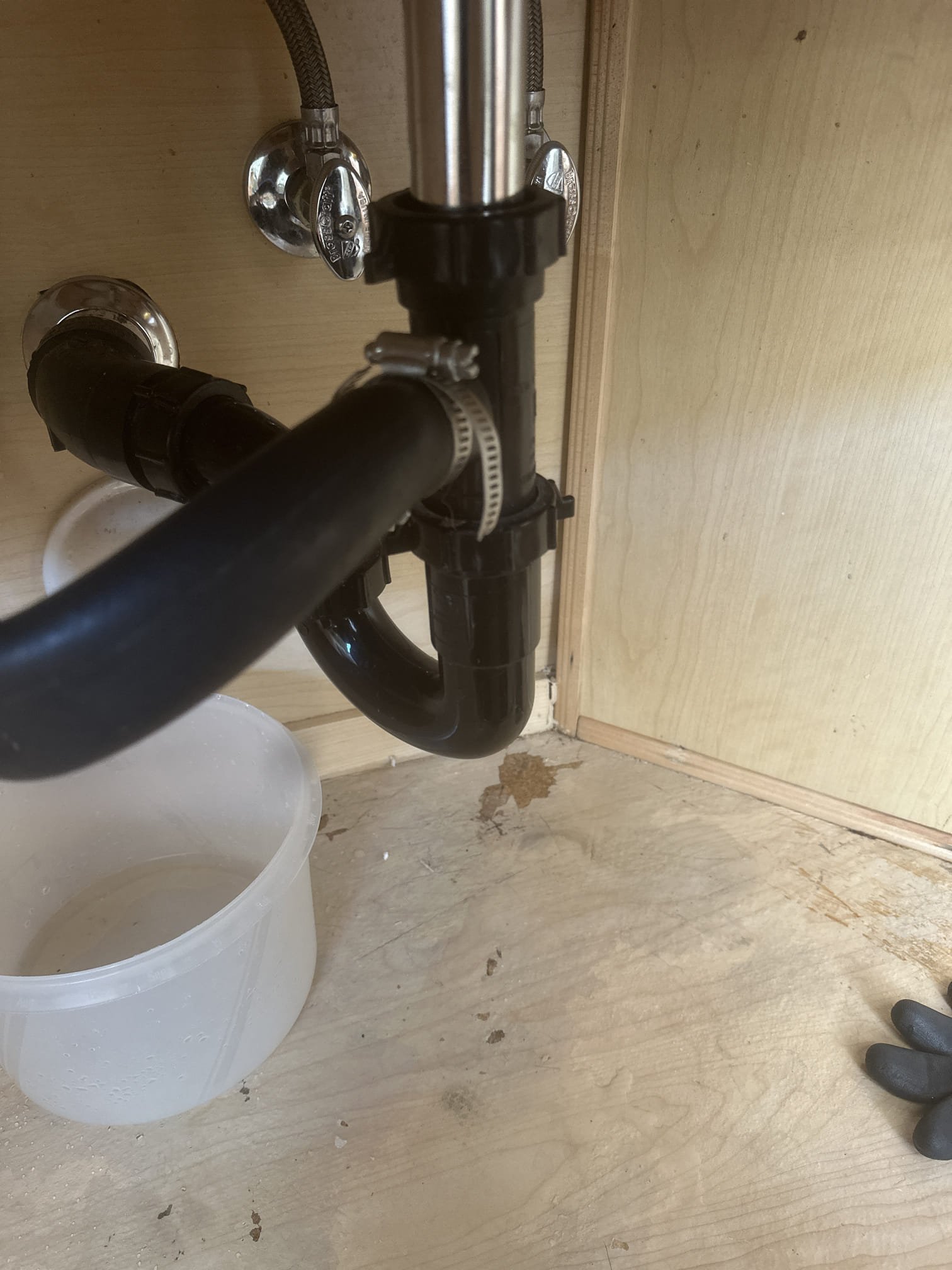 Demand Service Call – Clogged Condensate Drain
Upon arrival, inspected the condensate drainage system and found buildup at the sink drain connection where the condensate hose attaches, restricting proper drainage.
Removed the drain hoses and cleared the condensate line of accumulated buildup. Disconnected and cleared both P-traps, including the condensate P-trap, to ensure all accessible restrictions were removed.
Cleared buildup from the sink drain attachment and ensured the condensate drainage pathway was free of obstructions.
Repair Status: Condensate line and both P-traps cleared of accumulated buildup.